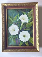 Front view of framed acrylic painting showing floral subject