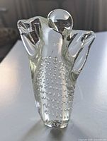 Front view of clear glass angel with bubble pattern