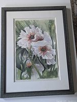 Full view of framed watercolor painting