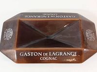 Brown ceramic Gaston de Lagrange advertising ashtray full view
