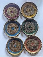 Top view of all six coasters showing colour variations and pattern
