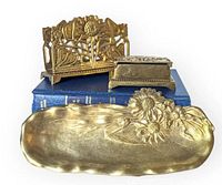 All three brass pieces grouped together