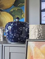 Jar displayed with lid on; shows overall shape and pattern