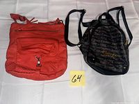 Both bags laid flat showing fronts and straps