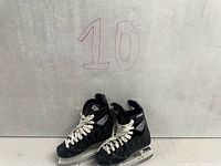 Full view of both CCM Intruder skates upright