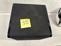 Top view of Paradigm subwoofer with fabric grille