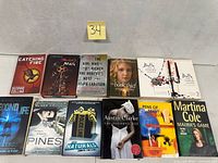 All twelve books front covers displayed