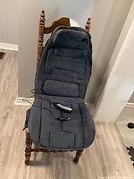 Full view of Snailax massage cushion draped over chair