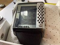Front view of Diesel DZ7123 watch showing LED display and grille