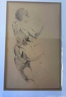 Close view of the nude conte sketch showing torso and artist initials