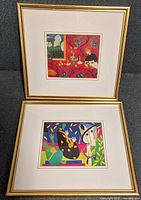 Both framed prints shown front view