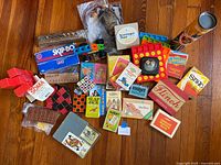 Wide view of all boxed and loose games spread on floor