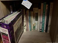 Shelf with Gardening Made Easy binder and row of books