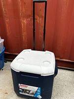 Cooler with handle extended