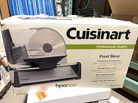 Retail box front showing Cuisinart food slicer branding