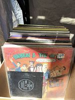 Box of LPs, Ruben & The Jets album visible at front