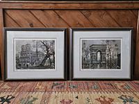 Both framed prints side by side showing overall condition and size relative to each other