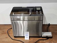 Front and side view of stainless steel Albohes breadmaker with power cord