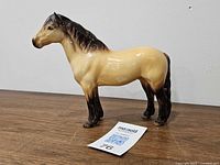 Left side view of Beswick Highland Pony figurine