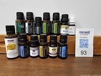 All bottles front and back rows on shelf with Now Frankincense in foreground