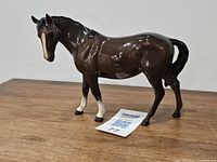 Left side view of Royal Doulton bay mare figurine