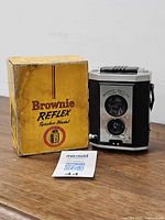 Camera, box, manual overview shot