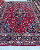 Full view of rug showing overall pattern and borders