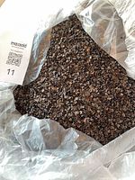 Close-up of buckwheat husks inside bag