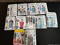 Front view of ten pattern envelopes showing McCall’s, Simplicity, Vogue