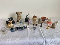 Group image showing all 26 miniature figurines and souvenirs