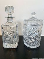 Square decanter and lidded ice jar side by side
