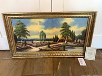 Frontal view of framed Kentsch oil painting with certificate visible