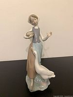 Front view of Lladró Girl with Goose figurine showing overall design