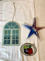 Group shot of all three glass ornaments