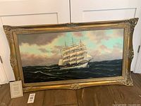 Framed painting with certificate and lot tag