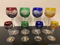 Group shot of eight coloured Nachtmann crystal stems