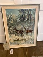 Framed painting with certificate displayed