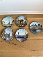 Group view of all five Paris landmark plates