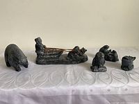 Group view of all five Al Wolf resin sculptures