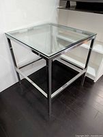 Full view of chrome frame table with glass top