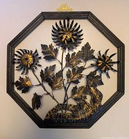 Front view showing full octagonal framed metal floral artwork