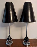 Front view of both chrome lamps with shades