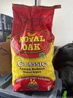 Front of sealed Royal Oak Classic charcoal briquets bag