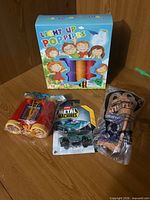 Group shot of all four packaged toys