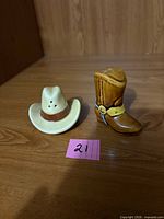 Front view of cowboy hat and boot shakers