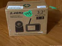 Front of sealed box showing product name, 3.2-inch screen call-out, 2.4 GHz, no Wi-Fi needed icons