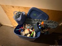 Overall lot in tote: mop, bottles, bucket