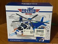 Back of box with blue variant image and Super Storm model name