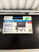 Front of boxed Mastercraft pocket digital multimeter kit