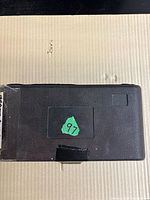 Closed black plastic case top view